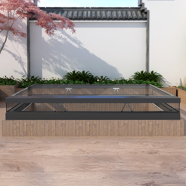 Electric rising basement skylight